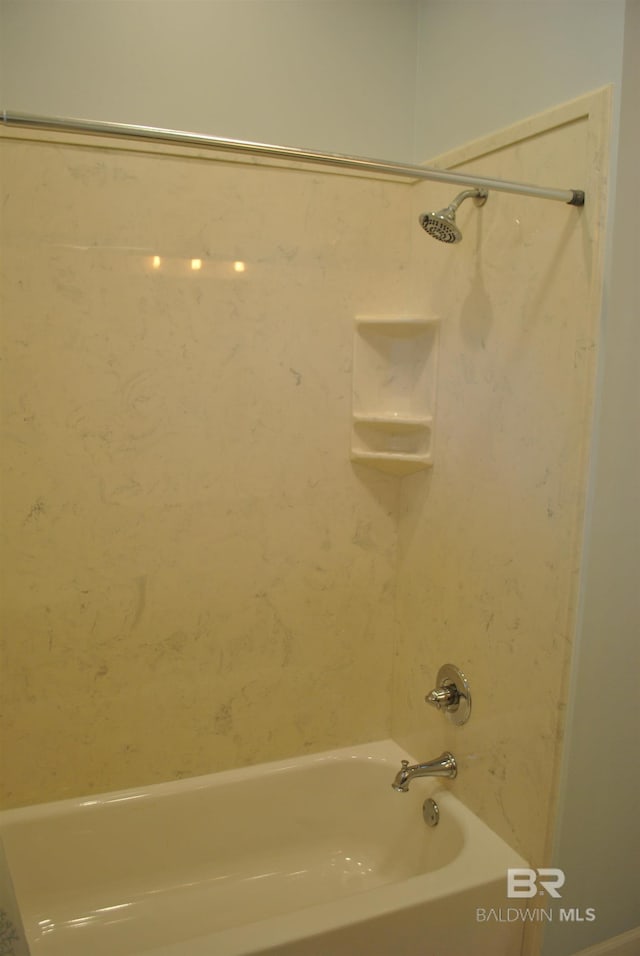 bathroom featuring bathing tub / shower combination