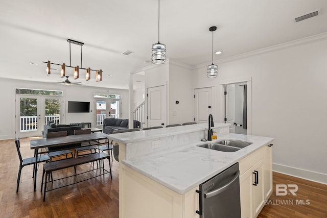 kitchen featuring visible vents, a sink, dishwasher, french doors, and dark wood-style flooring