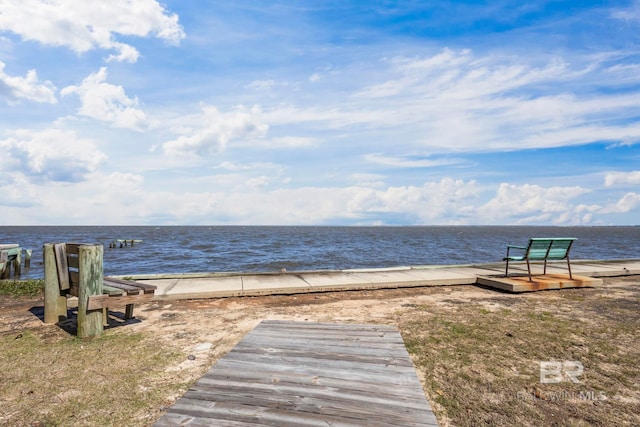 exterior space with a water view