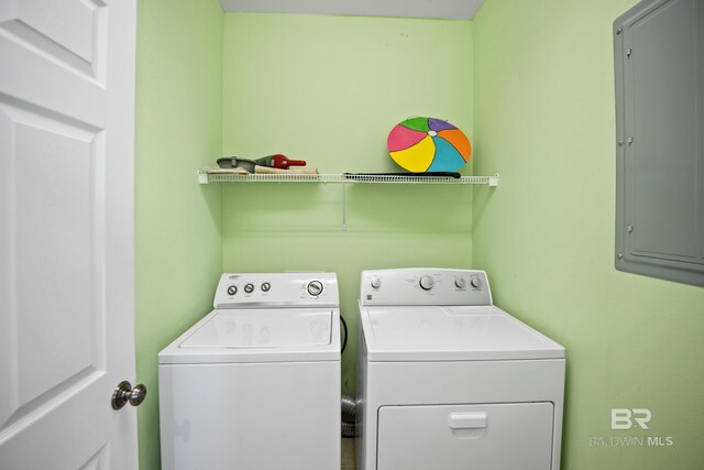 446 Harbor Light Cir, Gulf Shores, AL 36542 - washroom featuring independent washer and dryer and electric panel