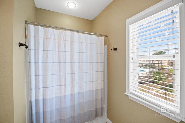 446 Harbor Light Cir, Gulf Shores, AL 36542 - bathroom with a shower with shower curtain