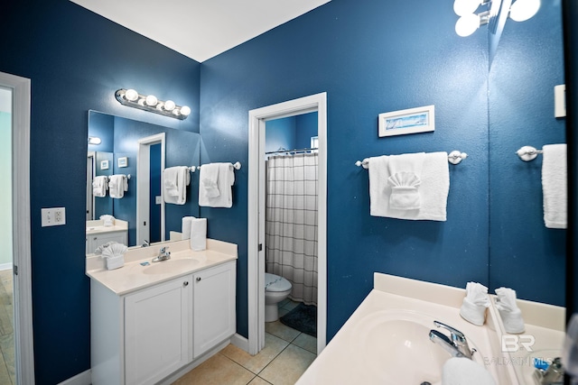 446 Harbor Light Cir, Gulf Shores, AL 36542 - full bath featuring tile patterned floors, vanity, toilet, and baseboards