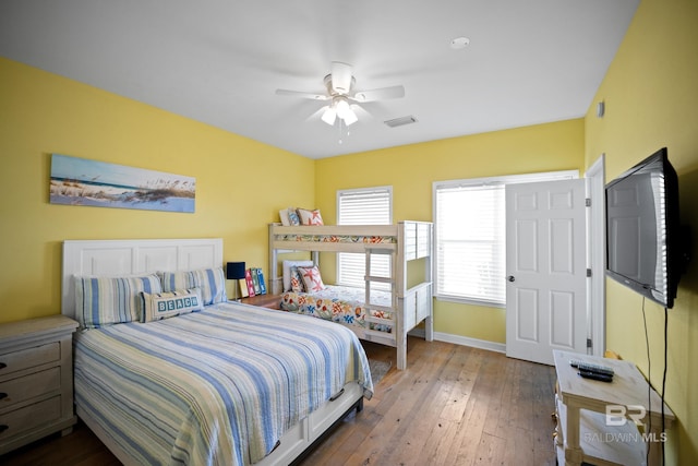 446 Harbor Light Cir, Gulf Shores, AL 36542 - bedroom with baseboards, hardwood / wood-style flooring, and a ceiling fan