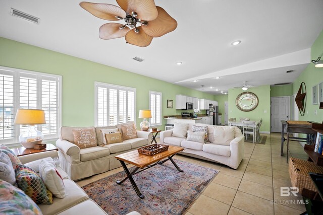 446 Harbor Light Cir, Gulf Shores, AL 36542 - living area featuring a ceiling fan and light tile patterned floors