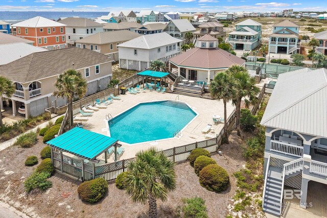 446 Harbor Light Cir, Gulf Shores, AL 36542 - community pool featuring a residential view and fence