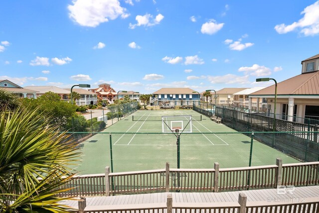 446 Harbor Light Cir, Gulf Shores, AL 36542 - view of tennis court with a residential view and fence