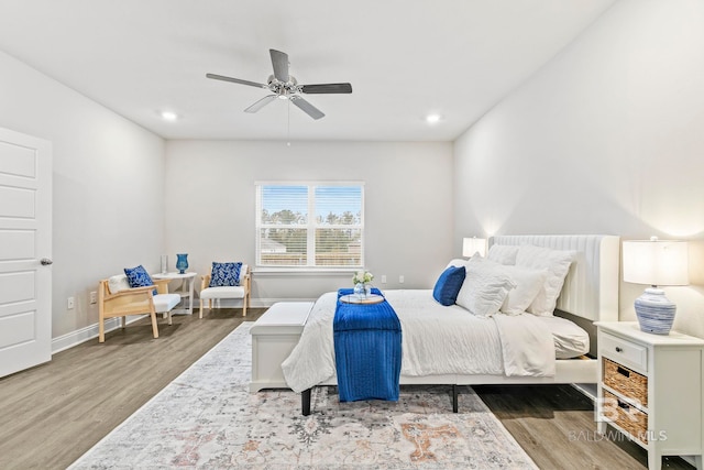 bedroom featuring ceiling fan and wood-type flooring