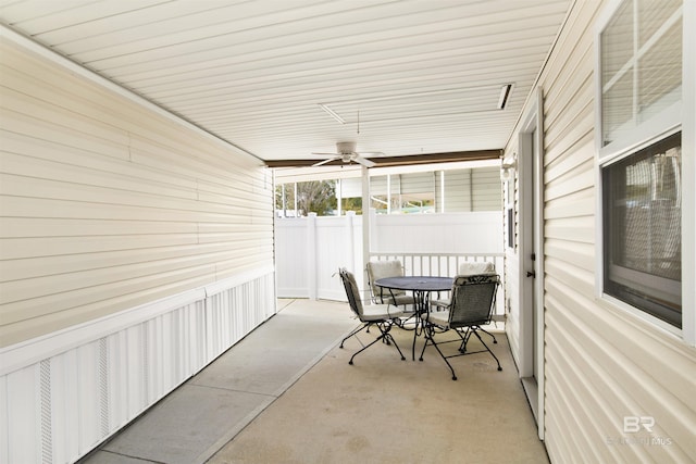 view of patio featuring ceiling fan