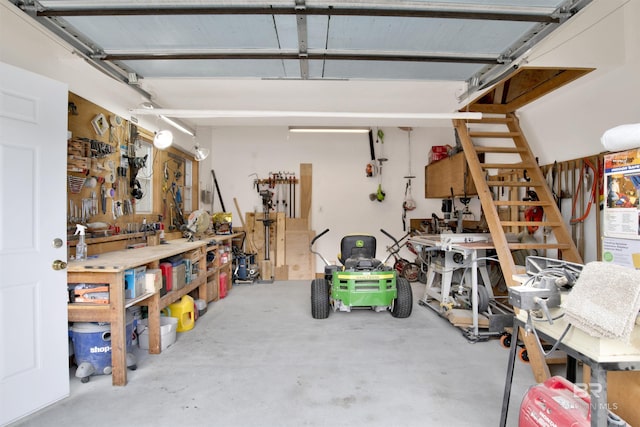 garage with a workshop area