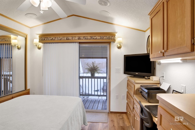 bedroom with light hardwood / wood-style floors, lofted ceiling, ornamental molding, ceiling fan, and access to exterior