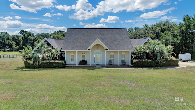 view of front of house featuring a porch and a front yard