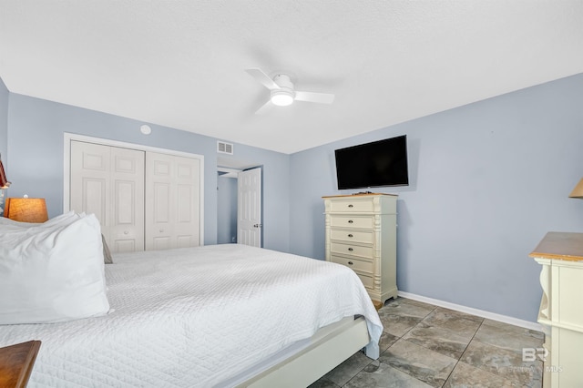407 W Beach Blvd Unit 570, Gulf Shores, AL 36542 - bedroom featuring a closet, baseboards, and a ceiling fan