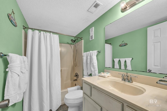 407 W Beach Blvd Unit 570, Gulf Shores, AL 36542 - bathroom featuring a textured ceiling, vanity, toilet, shower / bath combination with curtain, and tile patterned floors
