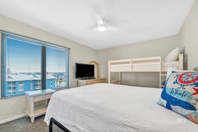 407 W Beach Blvd Unit 570, Gulf Shores, AL 36542 - carpeted bedroom featuring baseboards and a ceiling fan