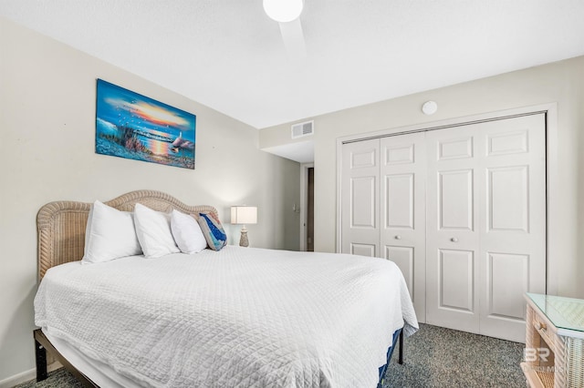 407 W Beach Blvd Unit 570, Gulf Shores, AL 36542 - bedroom featuring dark colored carpet and a closet