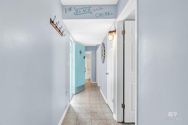 407 W Beach Blvd Unit 570, Gulf Shores, AL 36542 - corridor featuring light tile patterned floors and baseboards
