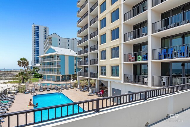 407 W Beach Blvd Unit 570, Gulf Shores, AL 36542 - community pool featuring a patio