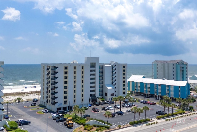 407 W Beach Blvd Unit 570, Gulf Shores, AL 36542 - view of building exterior featuring uncovered parking and a water view