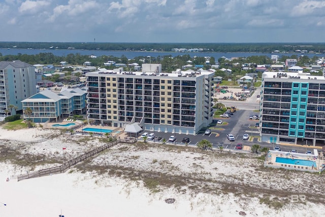 407 W Beach Blvd Unit 570, Gulf Shores, AL 36542 - drone / aerial view of a pool area and apartment complex / building