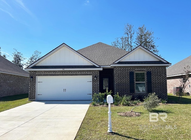 view of front facade with a front lawn and a garage