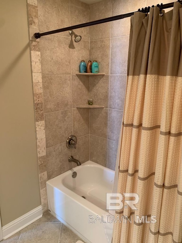 40 Bay Pointe Ct, Fairhope, AL 36532 - full bathroom featuring shower / tub combo with curtain, baseboards, and tile patterned floors