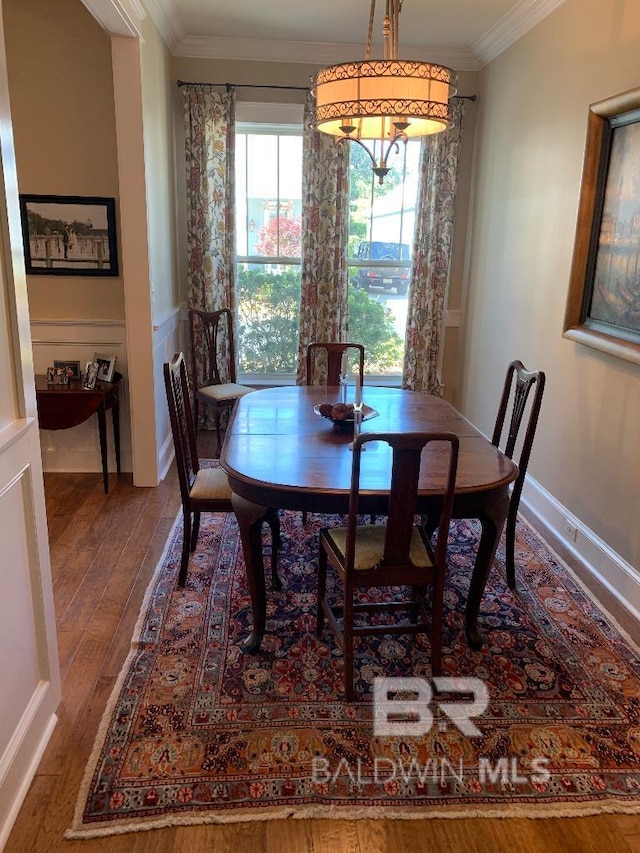 40 Bay Pointe Ct, Fairhope, AL 36532 - dining area featuring hardwood / wood-style flooring and crown molding