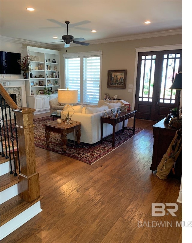 40 Bay Pointe Ct, Fairhope, AL 36532 - living room with a ceiling fan, ornamental molding, wood finished floors, recessed lighting, and a fireplace