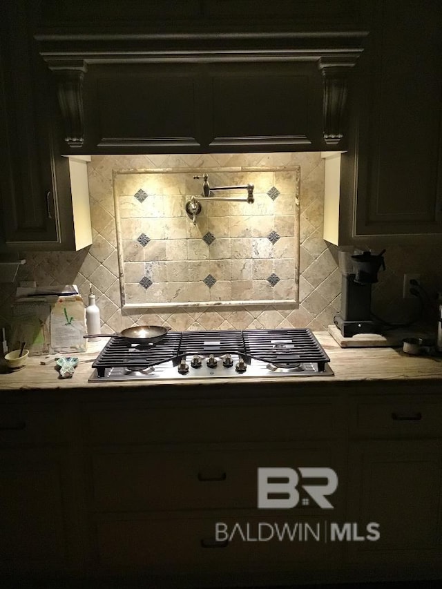 40 Bay Pointe Ct, Fairhope, AL 36532 - kitchen featuring tasteful backsplash, light countertops, and stainless steel gas stovetop