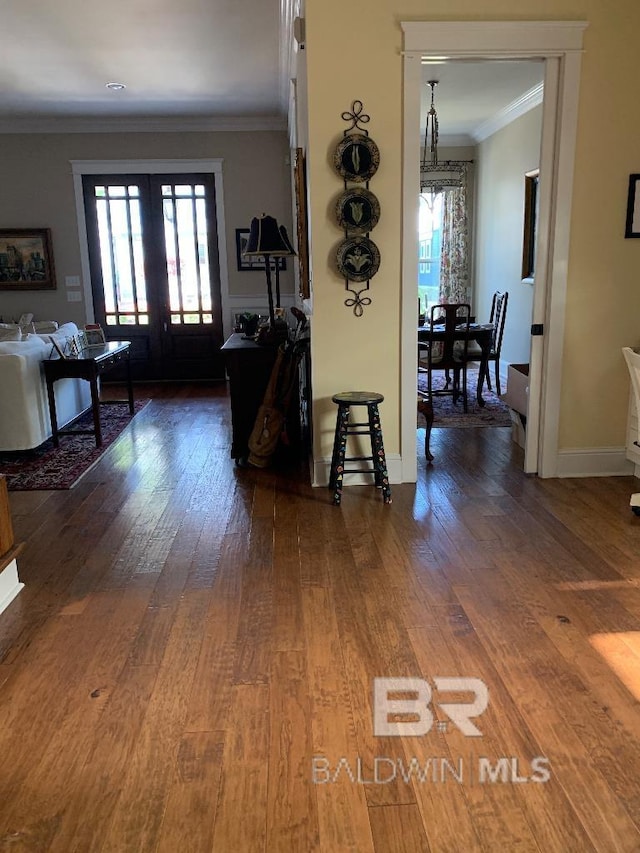 40 Bay Pointe Ct, Fairhope, AL 36532 - corridor featuring ornamental molding, healthy amount of natural light, wood finished floors, french doors, and baseboards