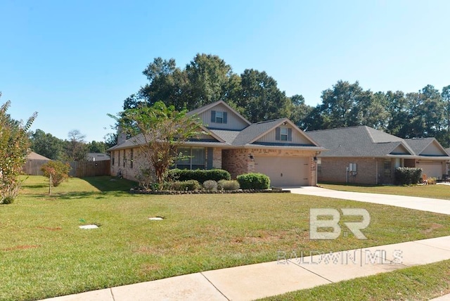 view of front facade featuring a garage and a front yard