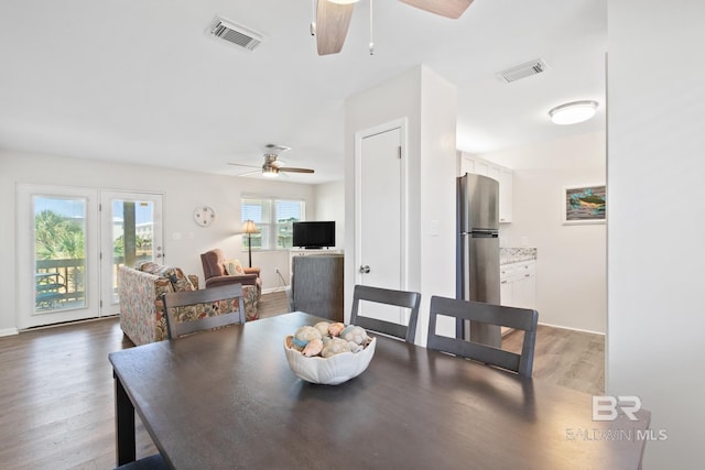 1028 W Beach Blvd Unit 4, Gulf Shores, AL 36542 - dining room with a ceiling fan and light wood finished floors