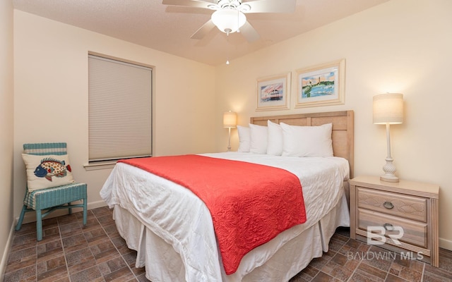 bedroom featuring ceiling fan