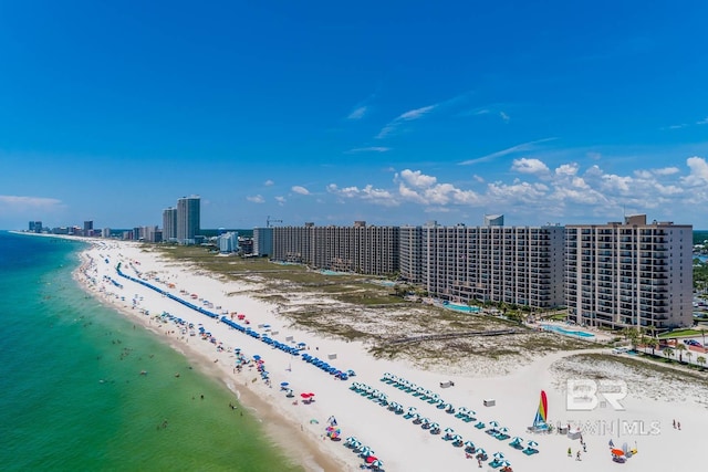 drone / aerial view with a view of the beach and a water view