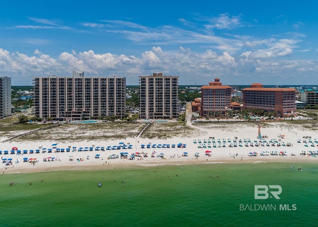 bird's eye view with a beach view and a water view