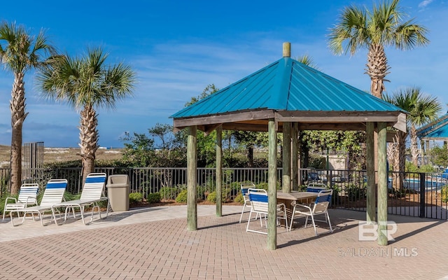 view of property's community featuring a gazebo and a patio area