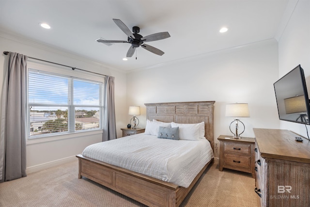 bedroom with light carpet, ceiling fan, and crown molding