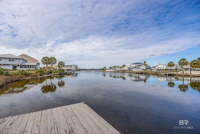 dock area with a water view