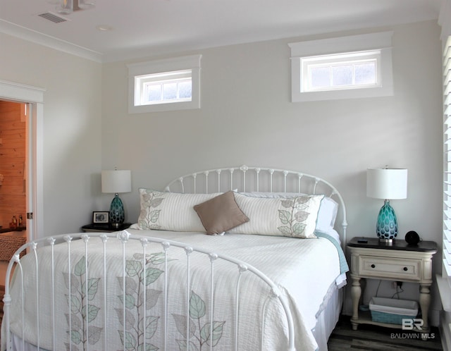 bedroom featuring visible vents