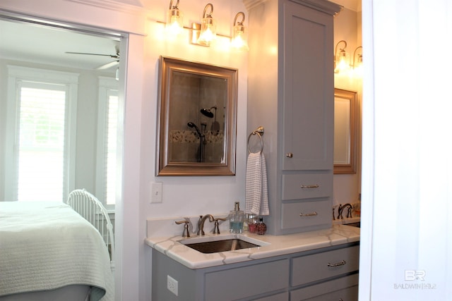 ensuite bathroom featuring a ceiling fan, vanity, and ensuite bathroom