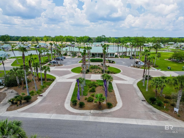 view of community with a water view