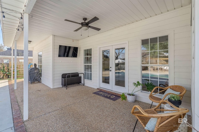 view of patio / terrace with ceiling fan and french doors