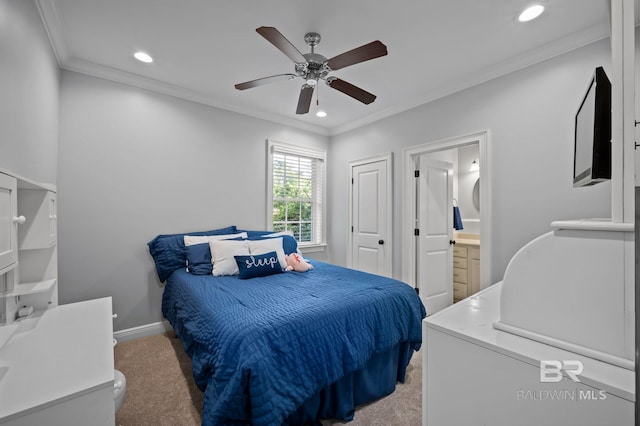 bedroom with baseboards, crown molding, recessed lighting, connected bathroom, and light colored carpet