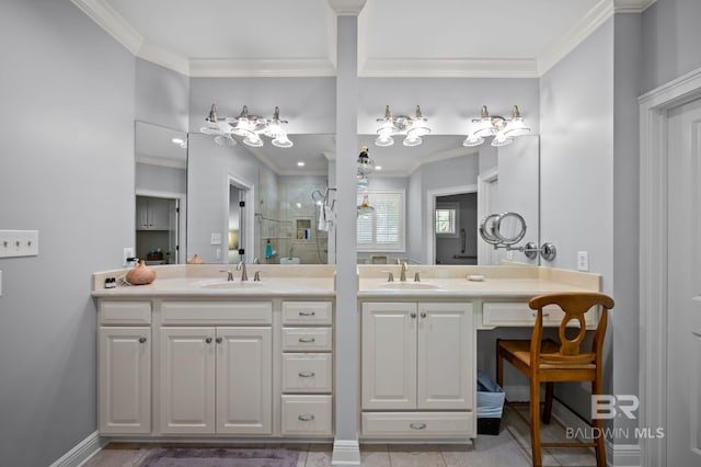 bathroom with a shower stall, double vanity, a sink, and ornamental molding