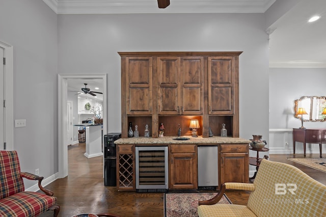 bar featuring wet bar, crown molding, wine cooler, dark wood-type flooring, and ceiling fan