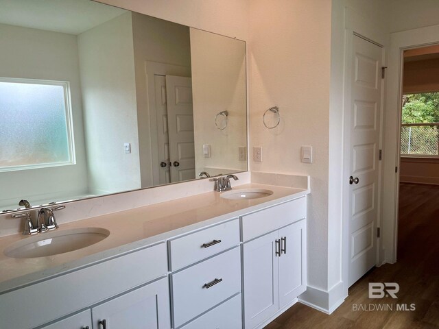 11006 Secretariat Blvd, Daphne, AL 36526 - full bath with wood finished floors, double vanity, and baseboards