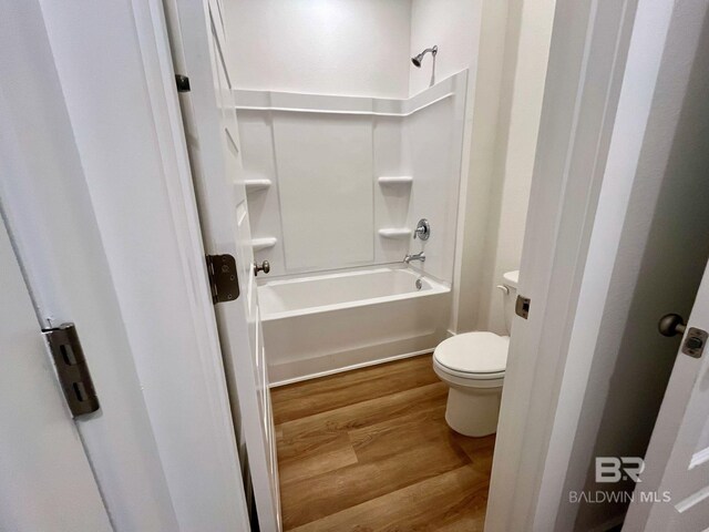 11006 Secretariat Blvd, Daphne, AL 36526 - bathroom with wood finished floors, toilet, and bathing tub / shower combination