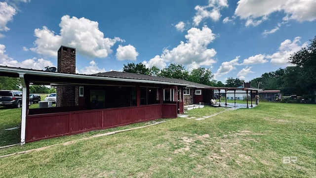 exterior space featuring a yard