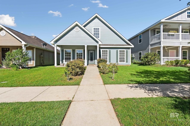 267 Galaxy St, Fairhope, AL 36532 - view of front of property with a porch and a front lawn