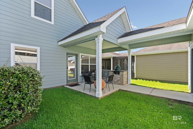 267 Galaxy St, Fairhope, AL 36532 - exterior space featuring a lawn, an outdoor kitchen, and a patio area