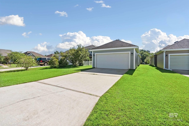 view of front of house featuring a garage and a front yard